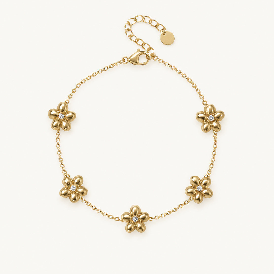 Bracelet Flora doré, chaîne fine à petites fleurs serties de strass