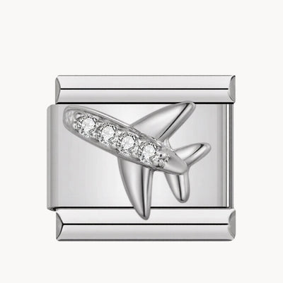 Charm italien Avion : avion argenté recouvert de strass, posé à plat sur le charm