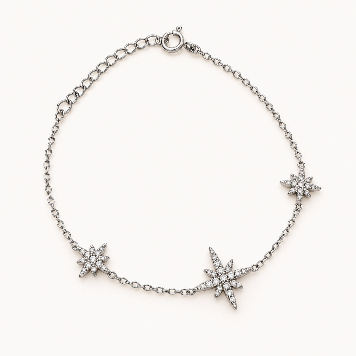 Bracelet Eclair argenté, trois étoiles pavées de strass sur chaîne fine